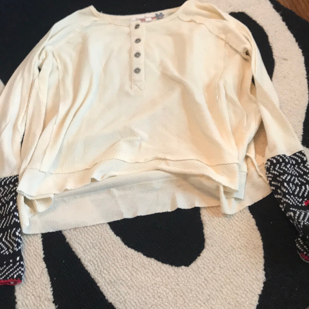 White bottom down long sleeve tee.